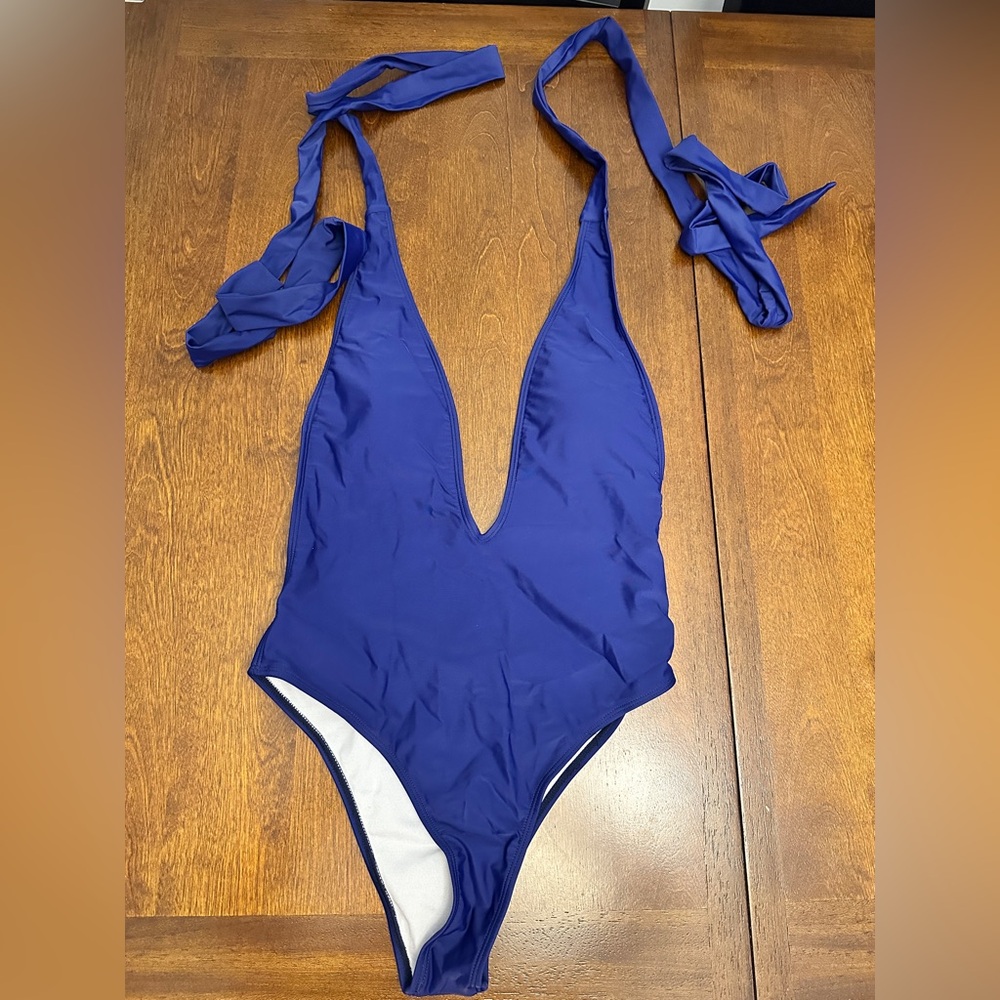 Elegant Women's Blue Low V One Piece Swimsuit